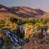 Les cascades d'Epupa falls, sur la rivière Kunene, qui marque la frontière entre l'Angola et la Namibie